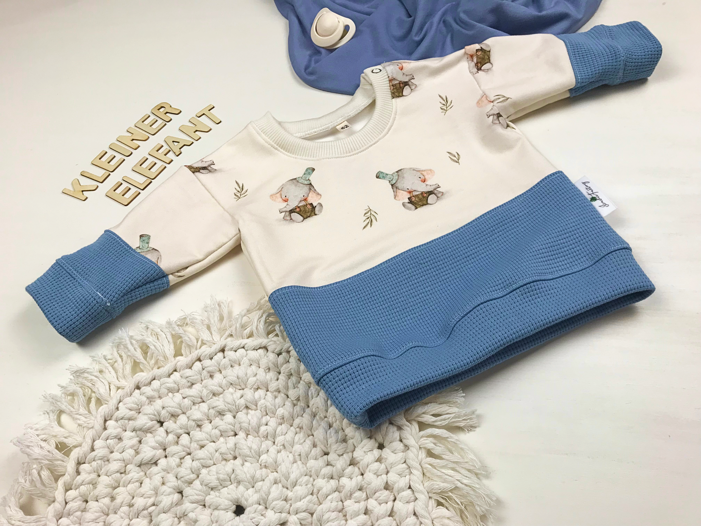 Baby- und Kleinkindpullover mit Elefantenmotiv