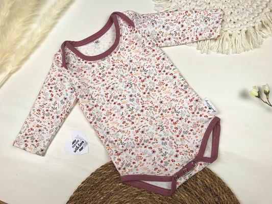 Babybody mit Blumenmuster