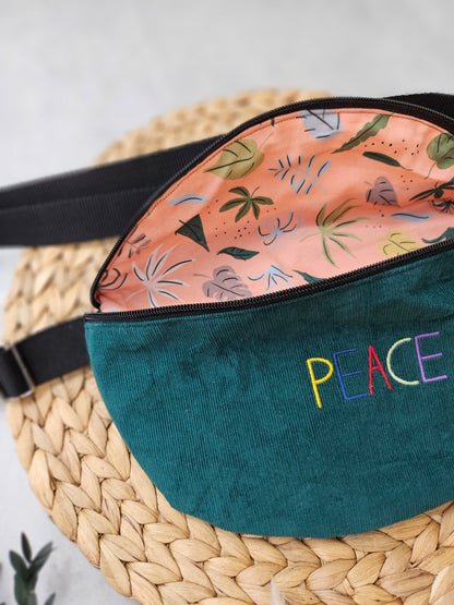 petrolfarbene Bauchtasche mit orangefarbenem Biobaumwollfutter mit Blättermotiv