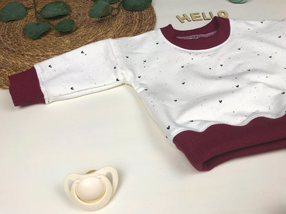 Baby- und Kleinkindpullover mit Herzen