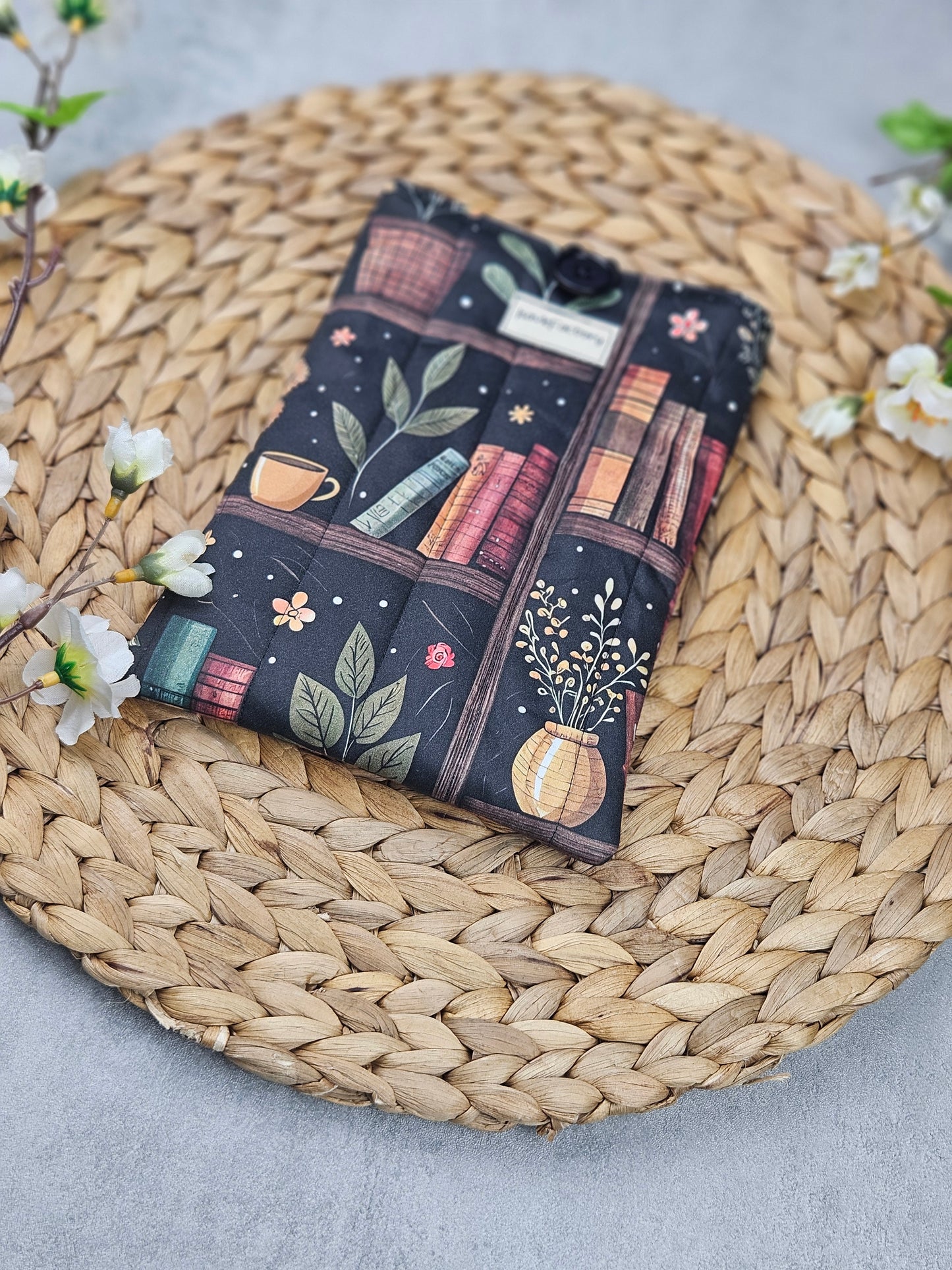 Kindlehülle mit Büchermotiv
